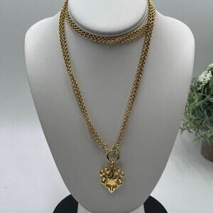 Vintage Joan Rivers 30"
Double Strand Goldtone
Chain Crest Shield Necklace
Charm